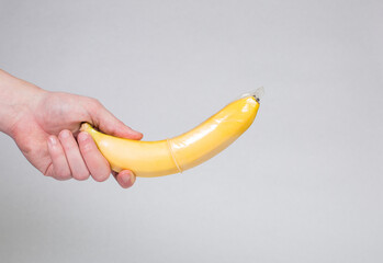 Condom put on a banana, contraception