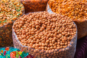 Japanese peanuts for sale at a market in Mexico. Market stall.
