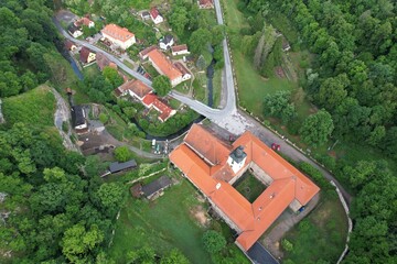 Aerial view of Svaty Jan pod Skalou monastery and village,Bohemia, Czech Republic,Europe