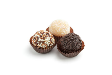 Typical Brazilian sweet brigadeiro. Assorted flavors of candies on a white background