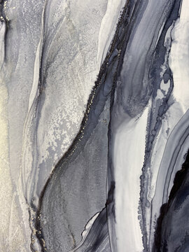 Abstract fluid art in grey, beige, and black with subtle gold accents. Alcohol ink, organic swirls, marbling effect. No real property or natural materials depicted.
