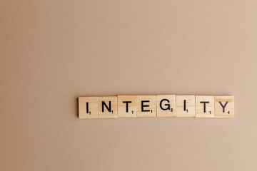 Integrity word on wooden letters