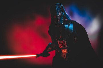 Naklejka premium NEW YORK, USA: DEC 29 2023 - Star Wars Duel's End Kenobi Series battle damaged Darth Vader revealing Anakin Skywalker face - Hasbro action figure