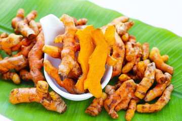 Turmeric roots on banana leaf