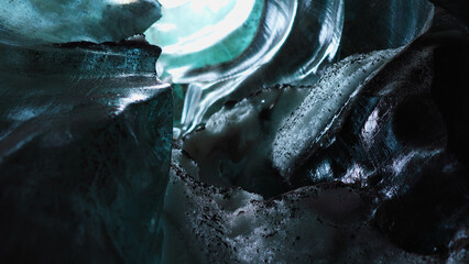 Blue ice blocks inside crevasse with covered frost in iceland, vatnajokull glacier mass with...