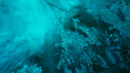 Majestic ice rocks in vatnajokull caves, transparent blue blocks of ice melting after global...
