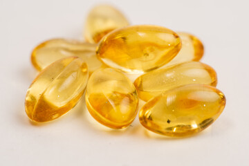 Capsules with medicine, capsules isolated on white. Medicine health care background,omega,fish oil