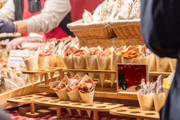 Market stall with different types of salami and sausages