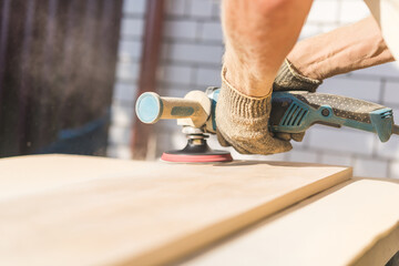 Grinding of an oak board with an angle grinder
