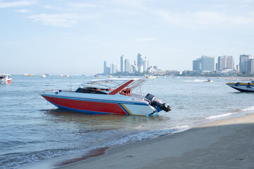 Amazing Thailand high season long tail and speed boat thai and foreign tourists at pattaya beach beautiful crystal emerald green sea chonburi Thailand