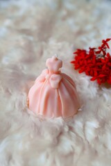 Scented Candle wax of a female with flowers 