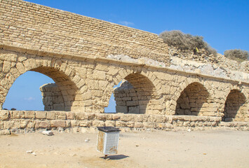 A section of the magnificent ancient Roman aquaduct, where it crosses the Mediterranean beach at Ceaserea Maritima in Israel