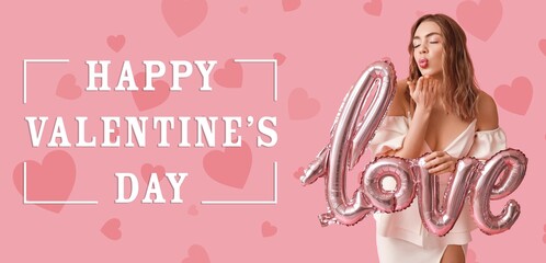 Happy young woman with balloon in shape of word LOVE blowing kiss on pink background. Banner for Valentine's Day celebration