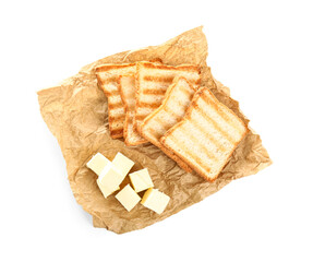 Baking paper with toasts and butter on white background
