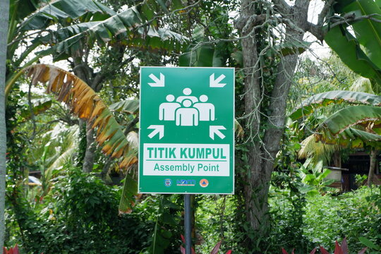 KDM, BPBD and Bontang company logos. green warning board Assembly Point or Assembly Point. Bontang, East Kalimantan, Indonesia. December 20 2023