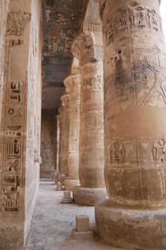 Woman studying the Narmer Palette, one of the oldest and most important Egyptian archaeological finds in the Egyptian Museum in Cairo