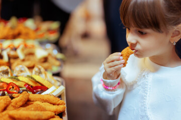 Picky Eating Child Choosing Something from a Food Platter. Little Kid having no appetite at Xmas...