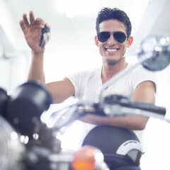 Happy man, portrait and motorcycle keys with helmet and sunglasses for transportation vehicle in...