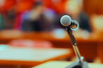 Microphone on a Table before a Press Conference. Mic ready for a political announcement in a meeting room
