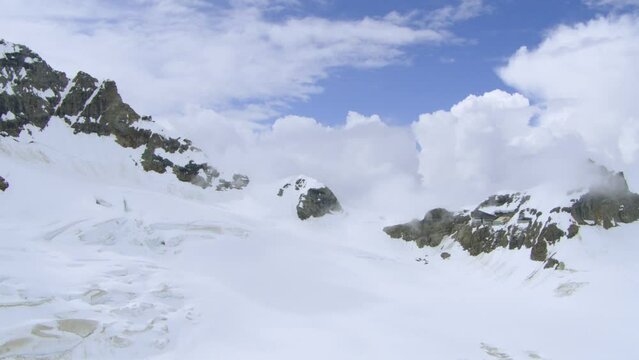Snowy Mountain Peaks of Gemmi Pass near Aletsch Glacier, Switzerland, Aerial