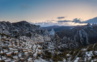 village of Castelmezzano in the Piccolo Dolomiti region of southern Italy at sunrise in winter