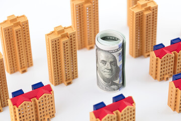 Models of residential buildings and dollar bills