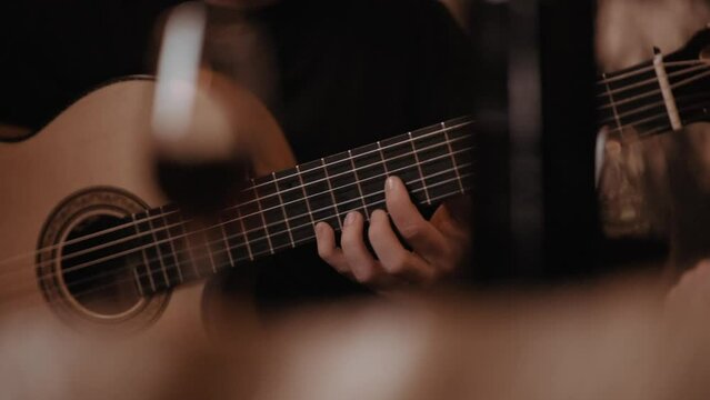 Flamenco guitar strumming in Cadiz, Spain