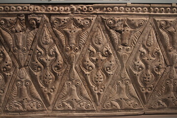 A close-up of a wood reveals intricate hands ticking