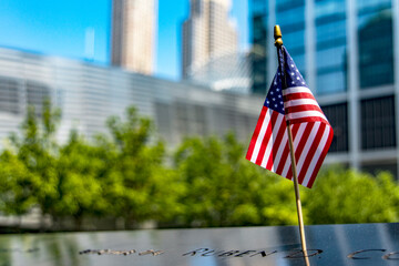Mural, waterfall and American flag at the site of the twin towers in tribute to the victims of the...