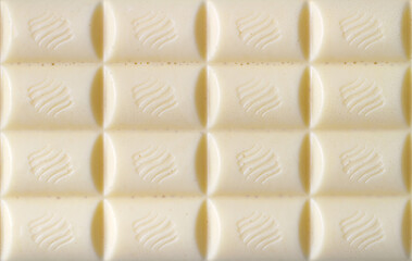 Close-up of a white chocolate bar. Sweet white chocolate. Close-up of confectionery.
