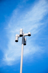 street lamp on blue sky background