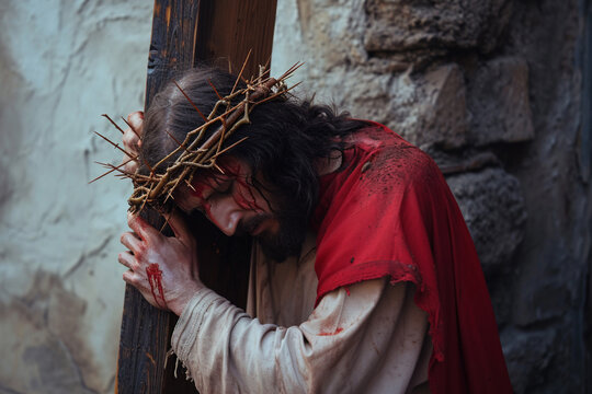 Jesus Christ wearing a crown of thorns carries his cross, Good Friday - Powered by Adobe