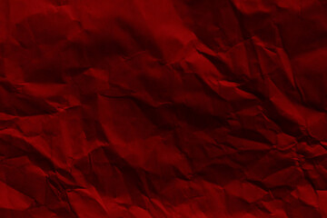 Red paper texture background. Crumpled paper backdrop. Wrinkled parchment paper. Grunge and rough...