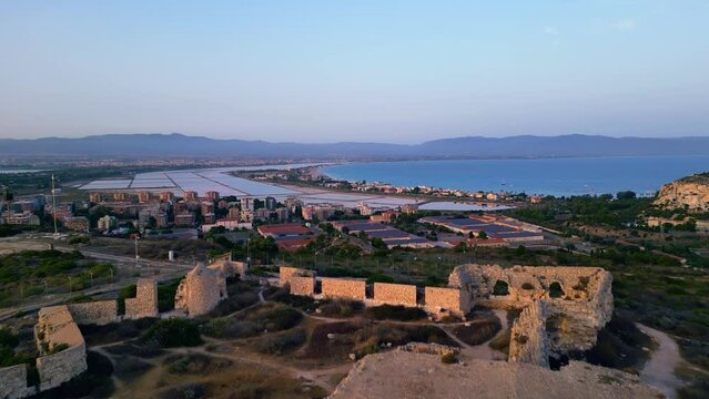 Sunrise on the Sardinian coast and Fortino di Sant'Ignazio landmark