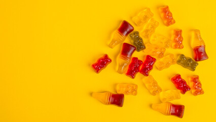 jelly bears candy isolated on a yellow background. Jelly Bean.