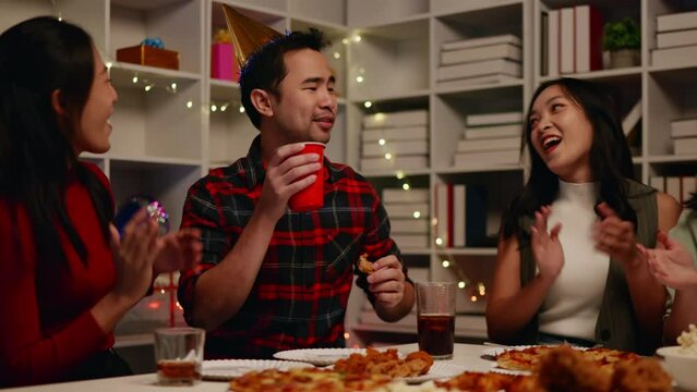 Friends join and celebrate the party with eating foods and drinks. Happy and joyful in holiday weekend and festival.