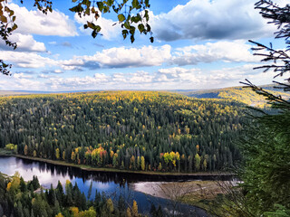 View from height on beautiful amazing landscape with trees, greenery, river below, distant horizon...