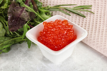 Red caviar in the bowl