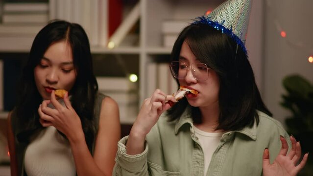 Friends join and celebrate the party with eating foods and drinks. Happy and joyful in holiday weekend and festival.