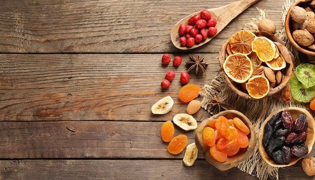 dried fruits on wooden table, top view