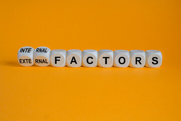 External or internal factors symbol. Turned cubes, changes words external factors to internal...