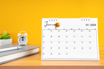 January desk calendar for 2024 year on work table. - obrazy, fototapety, plakaty