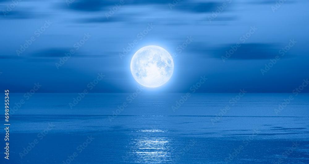 Poster night sky with full bright moon in the clouds 