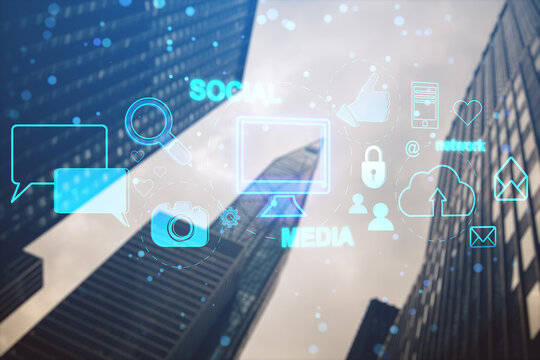 Creative social media interface with emails, speech bubbles, mobile internet, cloud computing and other icons on blurry city background. Double exposure. Toned image.