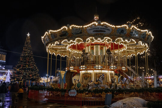 Kyiv, Ukraine - December 26, 2023: a New Year's tale was created at VDNG. The Christmas tree is decorated, there are many carousels and food stalls. people came to celebrate Christmas