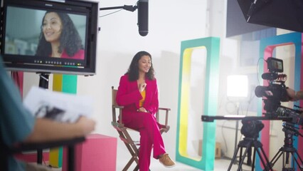 Portrait of Set Crew and Female TV Presenter Filming a Television Program Episode Using Modern Digital Camera. Team of Content Creators Making Educational Video to Post Online. Slow Motion