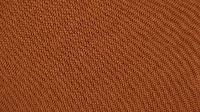 Soft Knitted Woolen Detailed Texture. Natural Fabric Closeup Knit Pattern. Brown Knitwear, Warm Cashmere Surface. Rotation, Macro. Cozy Textile Background. Clothes Production. Melange Yarn. Terracotta