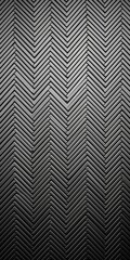 A sleek slate grey metal surface with a central sheen, framed by a unique zigzag pattern.Generative AI.