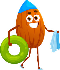 Cartoon almond nut character enjoys a beach stroll, carrying towel and rubber ring. Isolated vector playful whimsical kernel personage having water fun and joy at sunny day by the sea or swimming pool