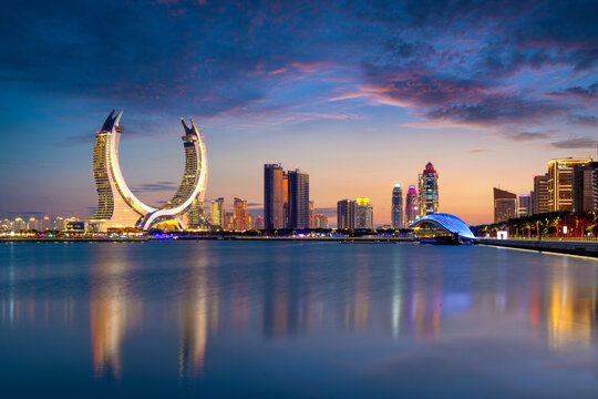 Lusail, Qatar - December 26, 2023: Katara buildings view from Lusail Marina Park. Crescent Tower  Fairmont doha 